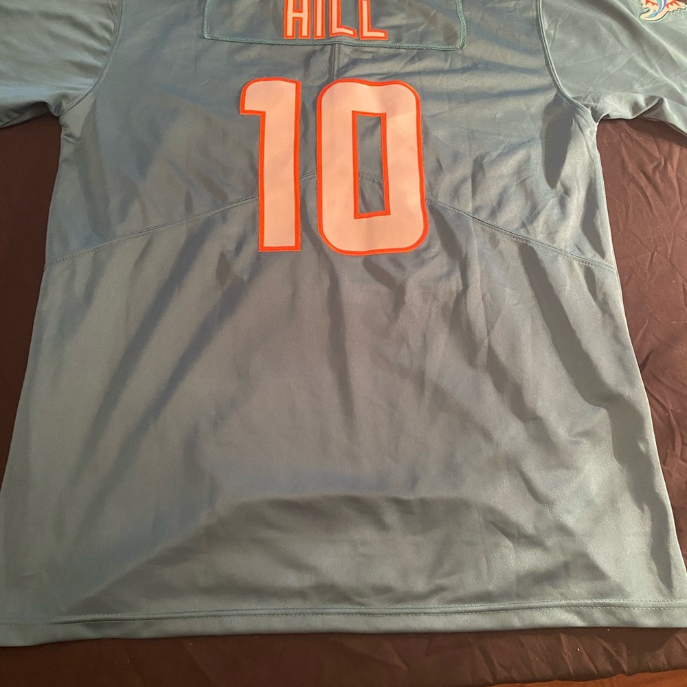 Light Blue Football Jersey with Orange Number 10
